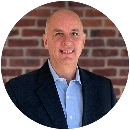 Professional headshot example of man with brick background