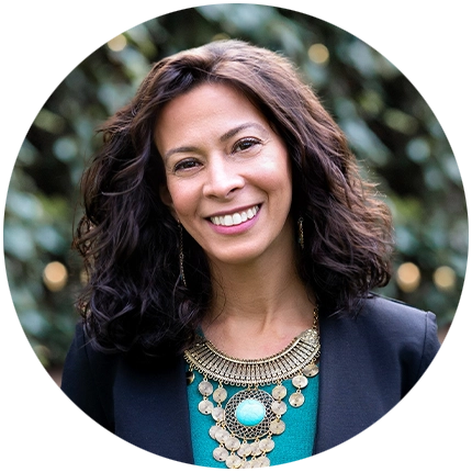 Professional headshot example of woman with natural background