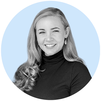 Casual headshot example of woman in black and white on light blue background shape.