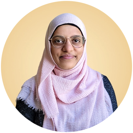 Casual headshot example of woman on yellow background.