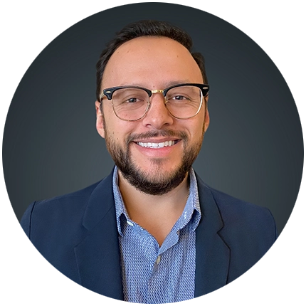 Corporate headshot example of man on dark grey backdrop