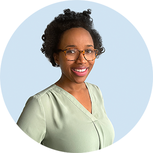 Virtual remote headshot example of casual woman on light blue backdrop