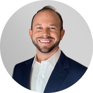 Virtual headshot example of professional man in suit on light grey background