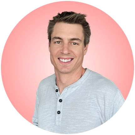 Playful headshot example of man on pink background