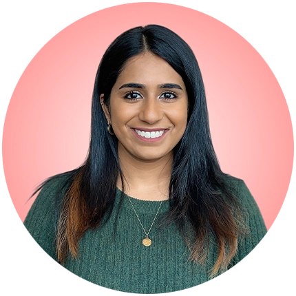 Playful headshot example of woman on pink background